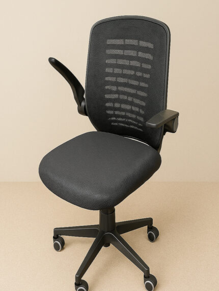 A modern ergonomic office chair (Model DE 543-1) with a black mesh back, cushioned seat, and nylon base, placed on a light wooden floor against a beige wall.