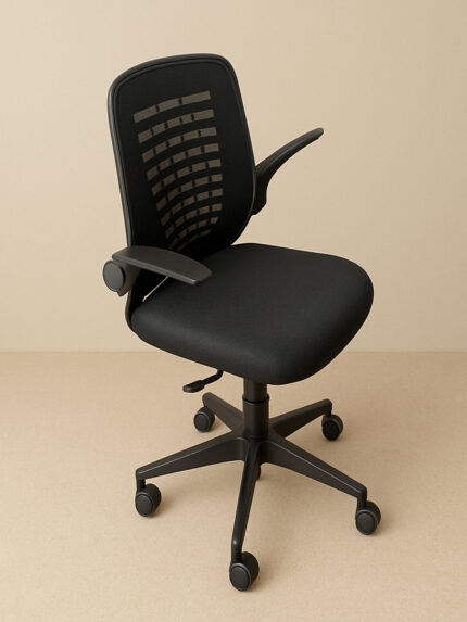 A modern ergonomic office chair (Model DE 543-1) with a black mesh back, cushioned seat, and nylon base, placed on a light wooden floor against a beige wall.